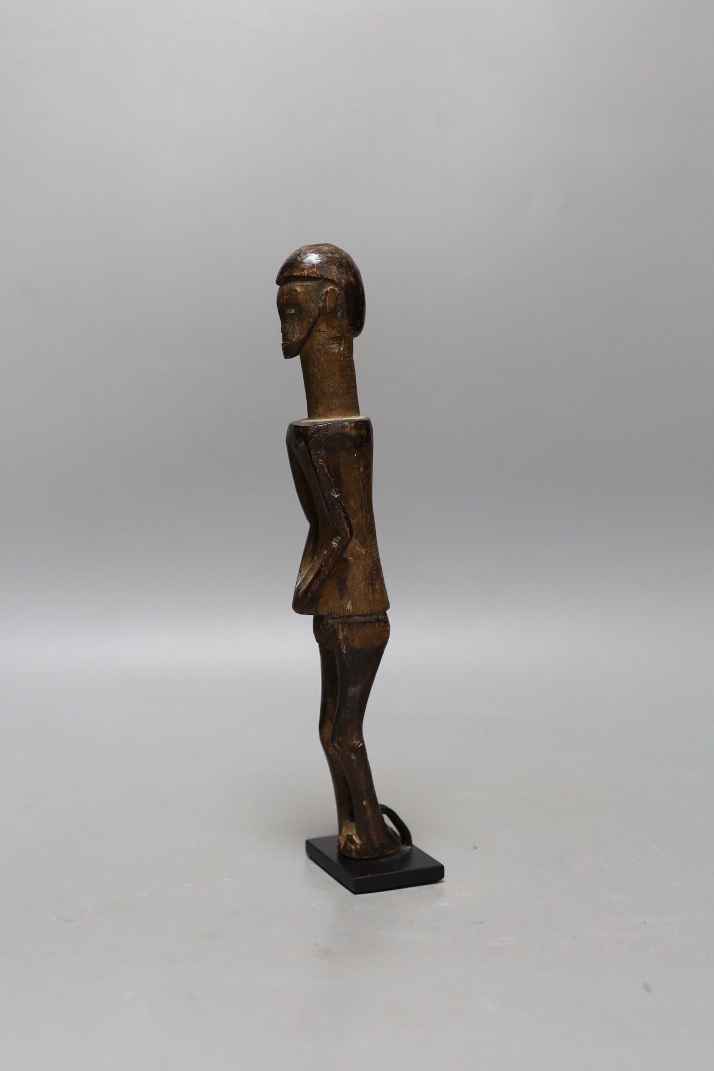 A West African figural carving on stand, 25cm excl stand